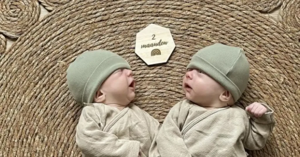 twins sleeping with hat