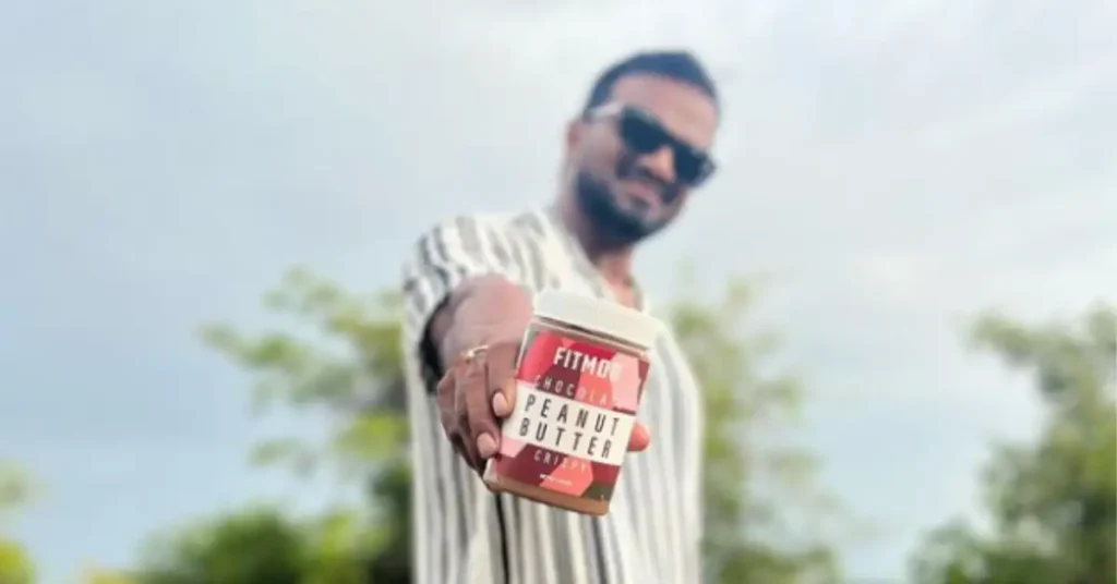 man holding peanut butter