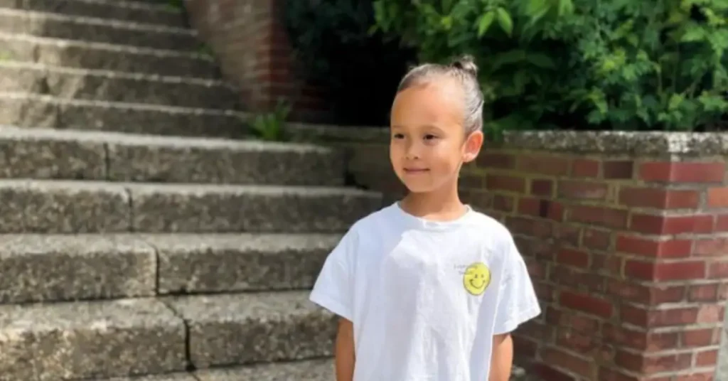 kid in front of stairs