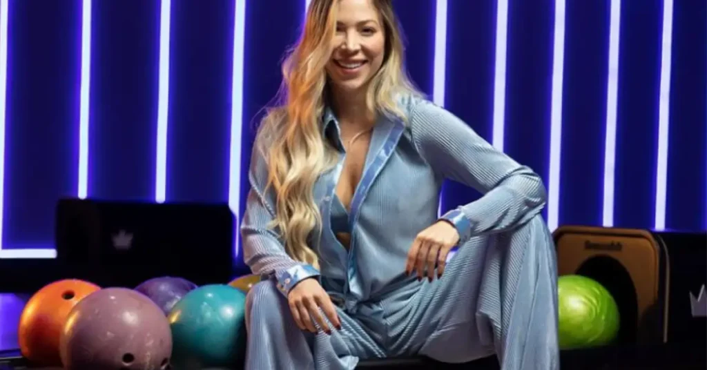 woman sitting on bowling balls