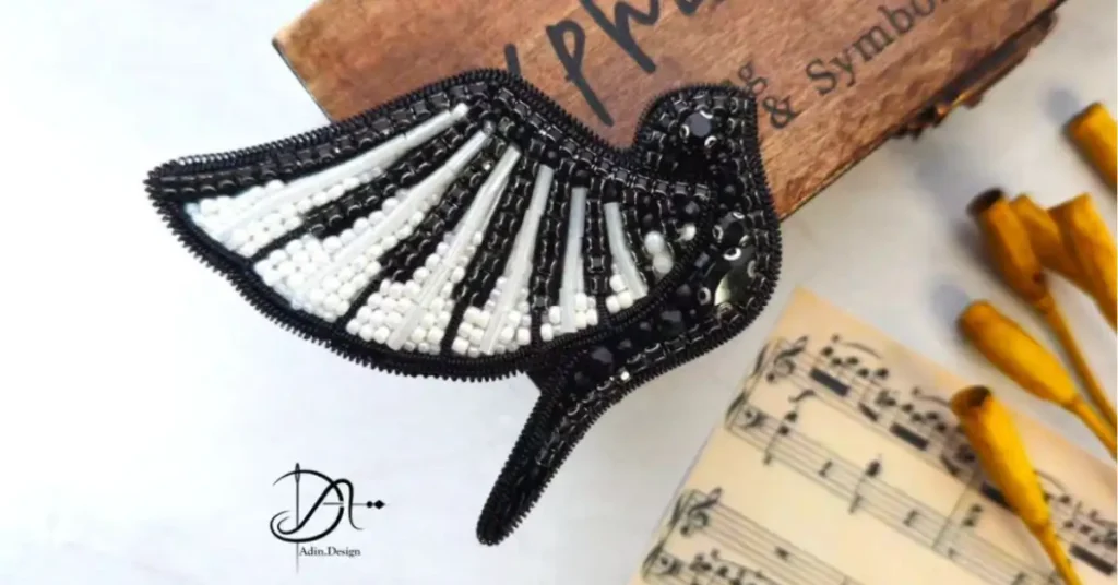 piano themed bird keychain