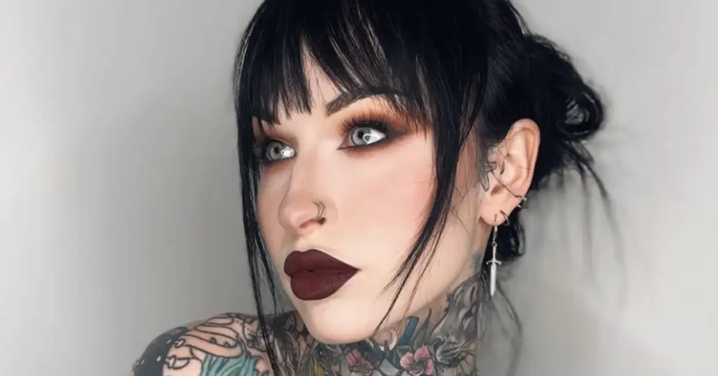 young tattooed goth woman