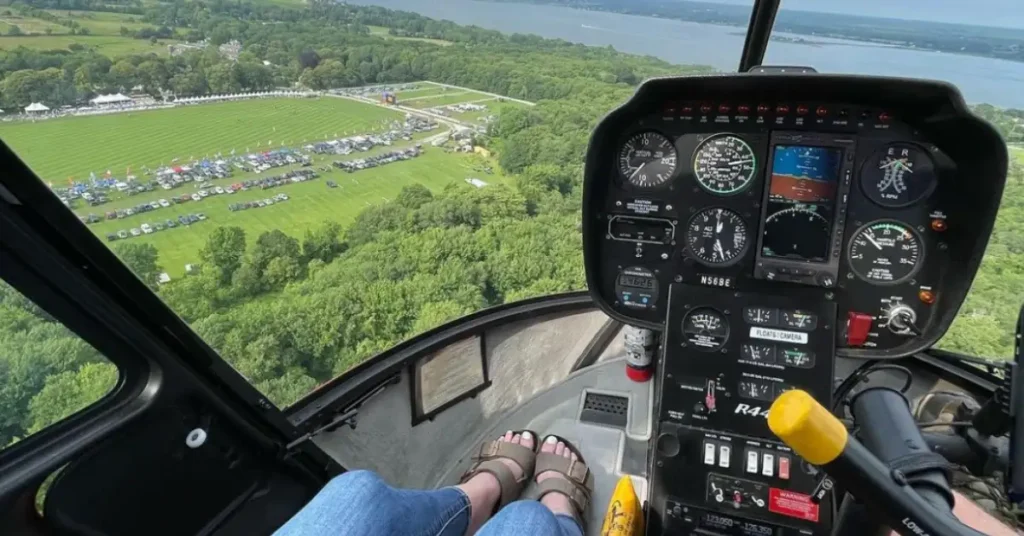woman flying over newport in a helicopter