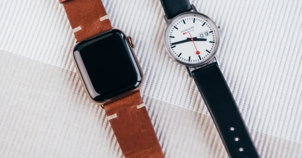regular watch and apple watch on a table