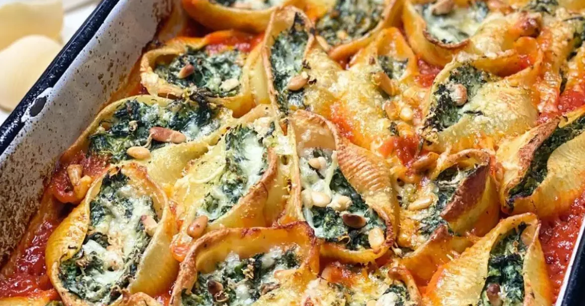Scalloped pasta with spinach ricotta filling