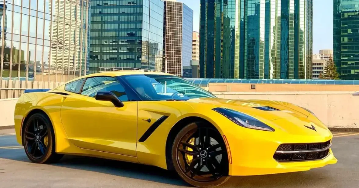 yellow corvette on a roof top