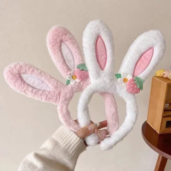 Easter Hats in pink and white held in hand