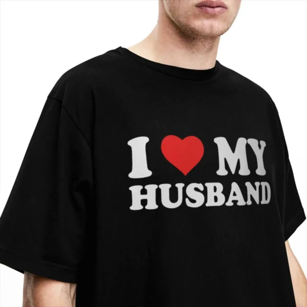 I Love My Husband T-Shirts in black worn by a man in front of white background