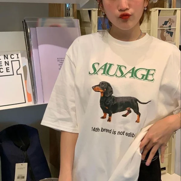 Puppy Love Shirt weared by a woman in front of a shelf with books