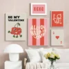 Valentines Day Wall Decor in various styles above a white sofa and lamp